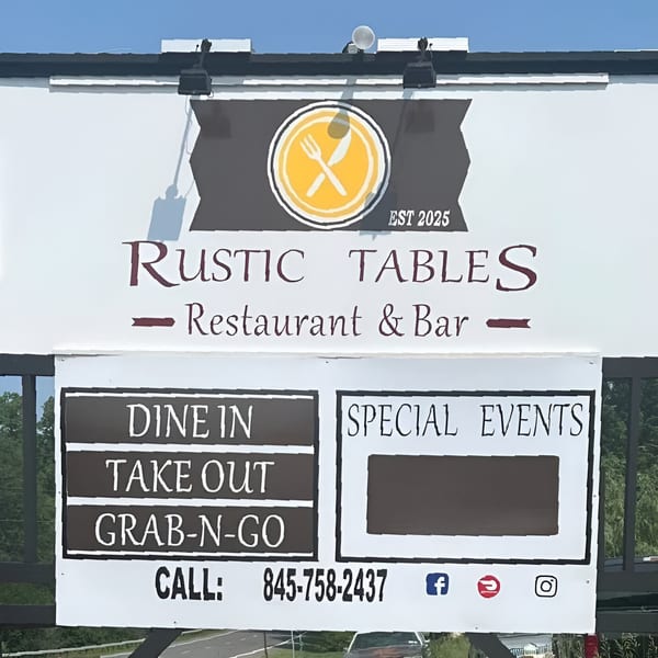 Rustic Tables Restaurant & Bar sign with logo, contact information, and service options.